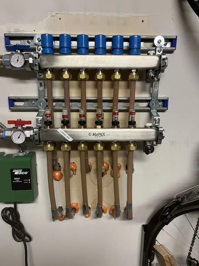 Plumber performing Water Heater Repair at a residential property in Holly Ridge